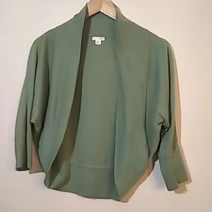 Green, hip-length sweater